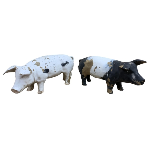 591 - Two resin butchers shop display pigs, L 60cm x H 23cm (2)