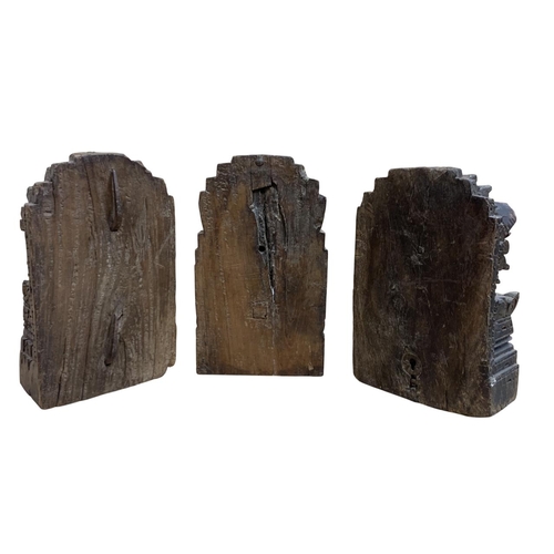 300 - Three antique hand carved wooden Indian temple blocks, likely salvaged from a temple column, each pi... 