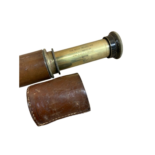 185 - The N.C.O Telescope by J.H Steward Ltd, brass and leather bound two draw telescope, inscribed 'The N... 