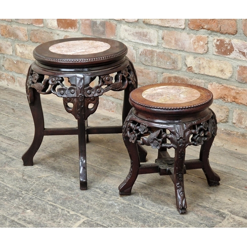 1233 - Two Chinese hardwood stands with inset marble tops and carved floral detail, H 45cm x diameter 36cm ... 