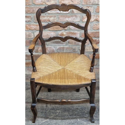 1259 - Pair of antique oak ladderback armchairs with rush seats, H 90cm (2)