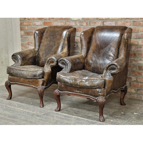 1273 - Pair of good quality studded leather wing armchairs raised on cabriole supports, H 108cm x W 93cm x ... 