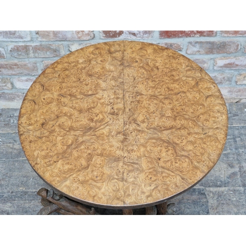 1281 - Antique Blackforest tilt top side table with circular burr walnut top raised on a carved naturalisti... 