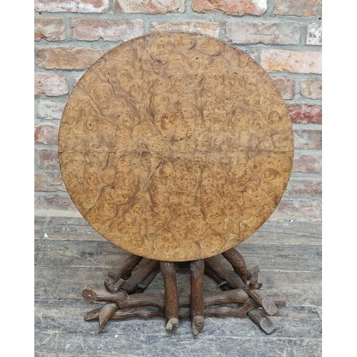 1281 - Antique Blackforest tilt top side table with circular burr walnut top raised on a carved naturalisti... 