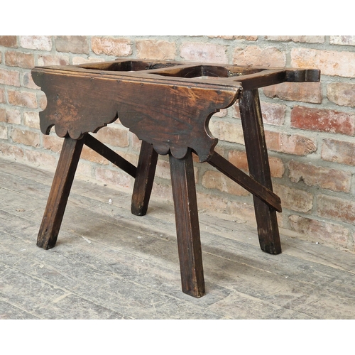 1282 - Antique Spanish elm bottle holder / trestle with shaped apron, H 57cm x W 84cm x D 40cm