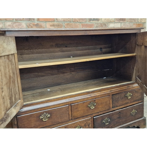 1291 - 18th century oak mule chest with carved fielded panels fitted with five drawers to base, H 118cm x W... 