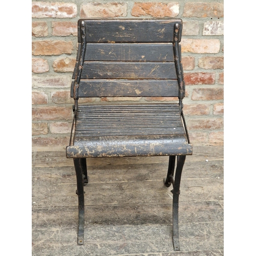 1313 - Antique iron reversible tram seat with slatted seat and back, H 83cm