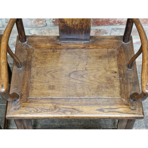 1202 - Pair of Chinese elm scholars hat chairs with yoke top rail and shaped splat above a rectangular pane... 