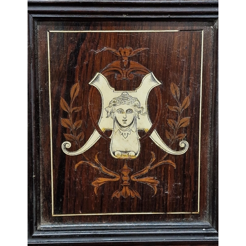 1208 - Victorian wooden and bone inlay wall hanging coat stand, having panelled front with mythical bone in... 