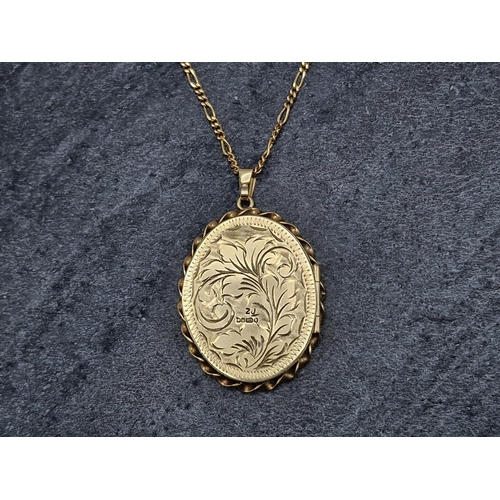 91 - 9ct locket pendant and chain, the chain 50cm long, 10.4g