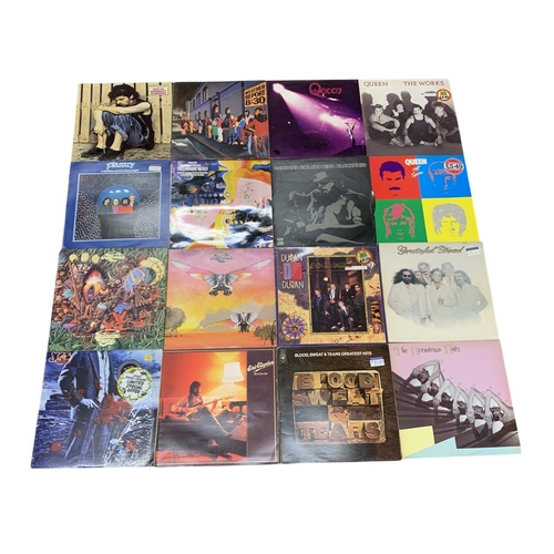 586 - Collection of mixed genre vinyl to include Queen, John Lennon, Duran Duran, The Beatles, Osibisa, El... 