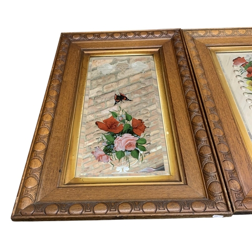 1185 - Pair of hand painted floral and butterfly Gypsy mirrors, held in carved oak frames, 82cm x 52cm