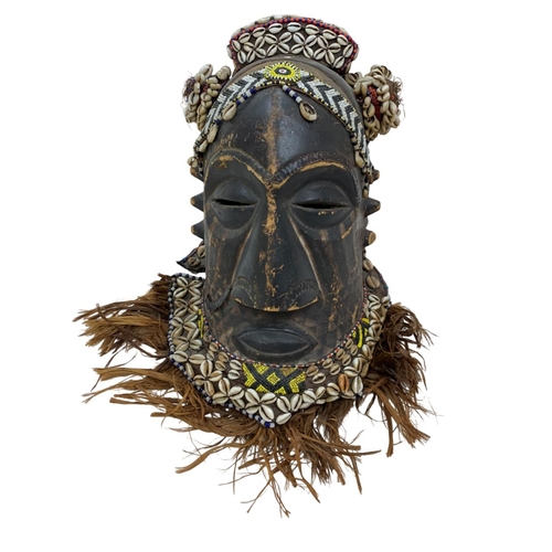 260 - 20th century Kuba/Kete African tribal mask, the carved wood mask being decorated with beadwork and c... 