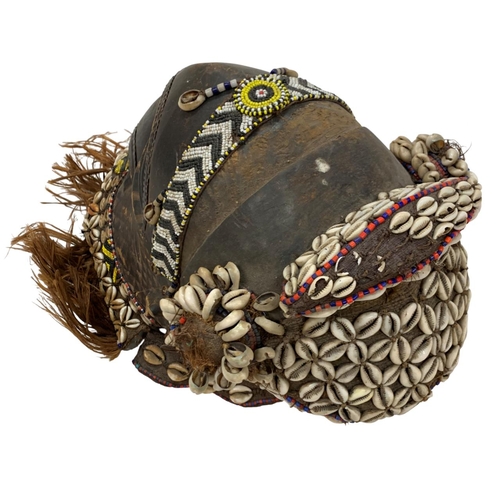 260 - 20th century Kuba/Kete African tribal mask, the carved wood mask being decorated with beadwork and c... 