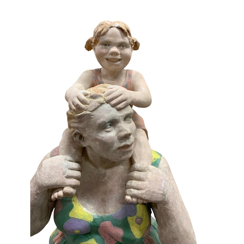 1470 - Deborah McCabe (20th/21st Century) Mother carrying daughter on shoulders, plaster sculpture, H 46cm