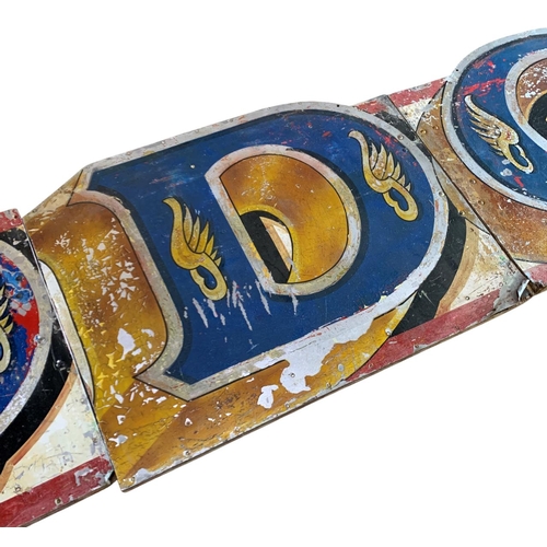 1056 - Fred Fowle (1914-1983) Very large vintage 'Dodgem' hand painted fairground running board, having a w... 