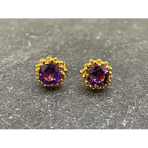 28 - Stylish pair of 9ct amethyst stud earrings, each 1ct amethyst, with butterflies, 2.6g