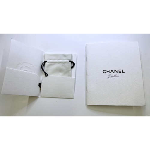 50 - 18ct Chanel 'Ultra T53' black ceramic articulated ring, size O, 11.3g, with orignal box and various ... 