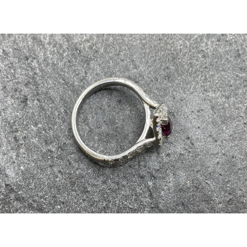 58 - Platinum garnet and diamond cluster ring, pear shaped garnet .45ct, framed with round brilliant cut ... 