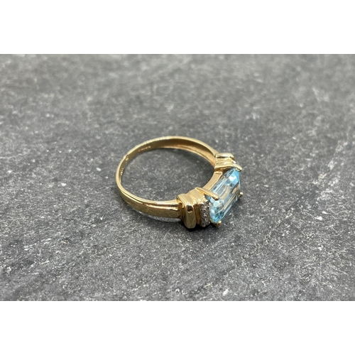 67 - 9ct blue topaz and diamond cocktail ring, the topaz 2ct approx, size O, 2g