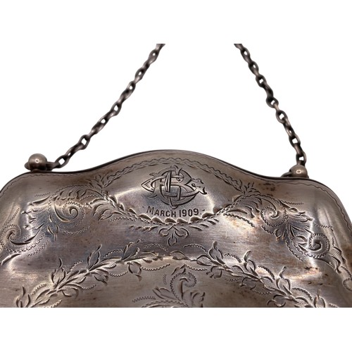 114 - Edwardian silver purse, engraved with scrolled foliage, leather interior, maker Joseph Gloster, Birm... 