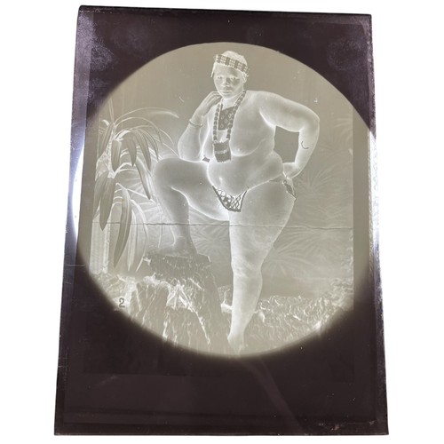 175 - Mixed quantity of antique glass negative slides depicting nude women, some performing unspeakable ac... 