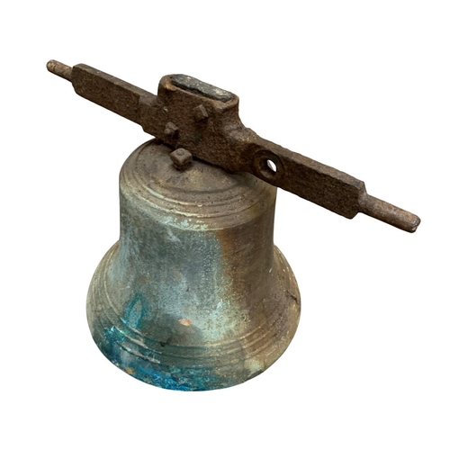 506 - Large bronze church bell, having original clapper and metal bracket, H 40cm x D 34cm