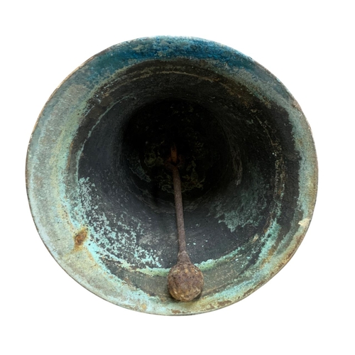 506 - Large bronze church bell, having original clapper and metal bracket, H 40cm x D 34cm