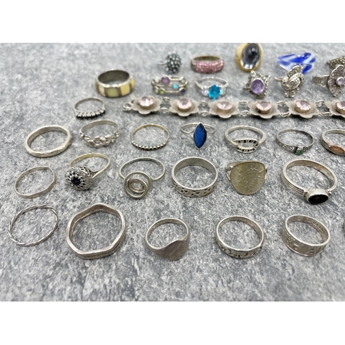 102 - Large collection of fifty two mainly gem set silver rings, 163.3g, with eight further costume rings ... 