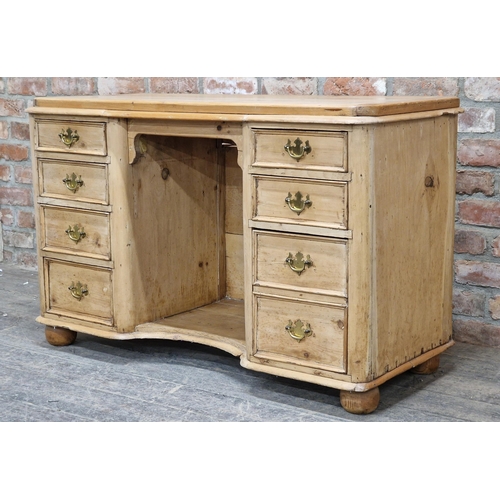 1348 - Victorian stripped pine desk / sideboard fitted with eight drawers, raised on bun feet, H 74cm x W 1... 