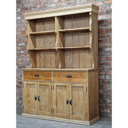 1350 - Antique stripped pine two sectional dresser with two drawers and four hinged cupboard doors revealin... 