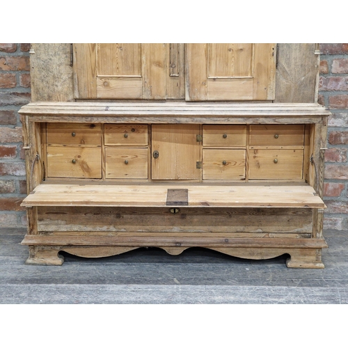 1361 - Gustavian period stripped pine housekeepers cupboard, the top with two arched panelled doors reveali... 