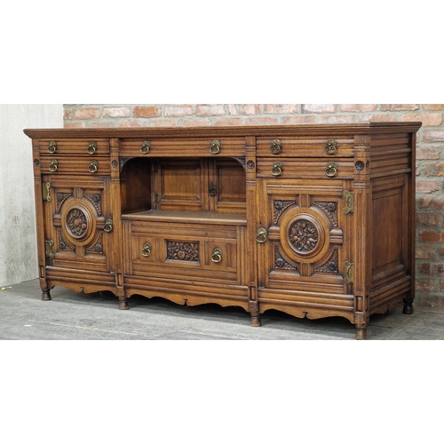 1362 - Antique oak sideboard with carved floral detail, fitted with an arrangement of drawers and cupboards... 