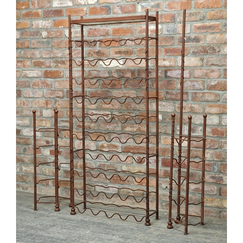 1372 - Vintage three sectional iron wine rack together with matching wall brackets, H 157cm x W 68cm x D 23... 