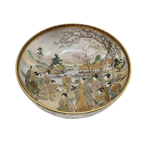 312 - Meiji period Satsuma bowl or dish, interior painted with a communal pagoda garden scene with robed d... 