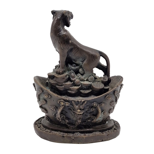 317 - Chinese bronze year of the Tiger wealth ornament, 11cm high