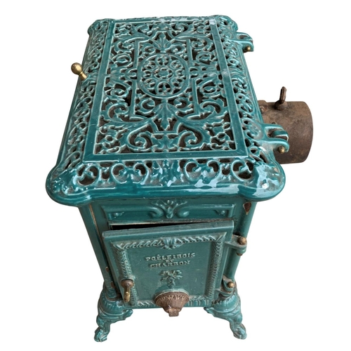 1013 - English French style Le Select enamel stove, emerald colour cast and pierced with acanthus and swags... 