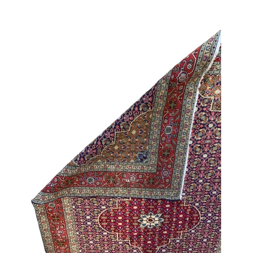 1728 - Good quality Sarouk rug, with intricate floral design, red ground, 300cm x 195