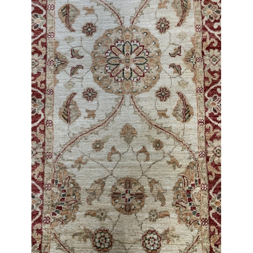 1730 - Turkish Caucasian runner, typical scrolled foliage, cream dye ground, 195cm x 75cm