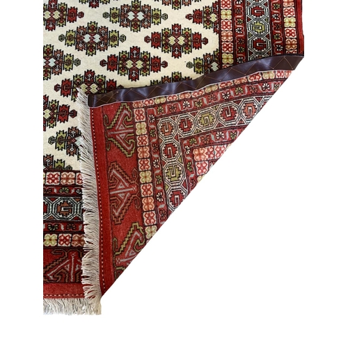 1731 - Khorasan rug, geometric design, red and cream base, 200cm x 125cm