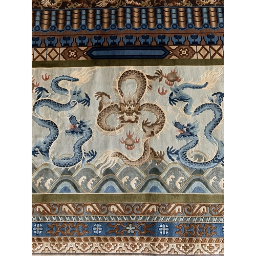 1733 - Good quality Chinese silk rug, with relief of Chinese pearl chasing dragons, 275cm x 125cm