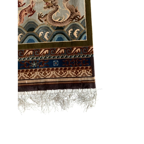 1733 - Good quality Chinese silk rug, with relief of Chinese pearl chasing dragons, 275cm x 125cm