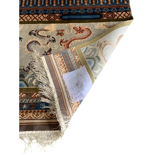 1733 - Good quality Chinese silk rug, with relief of Chinese pearl chasing dragons, 275cm x 125cm