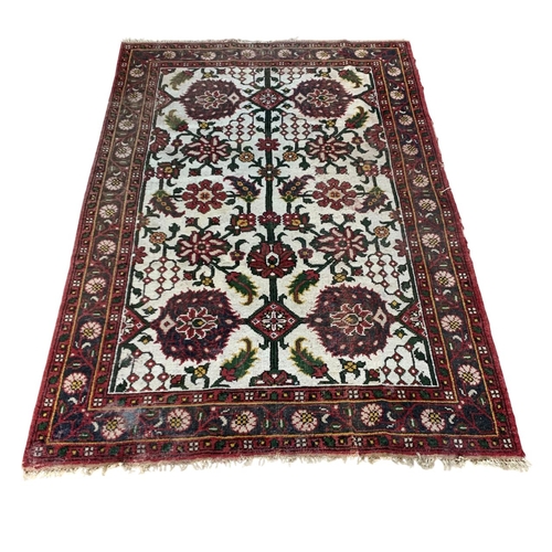 1734 - Attractive Afghan rug with floral design, 270cm x 185cm