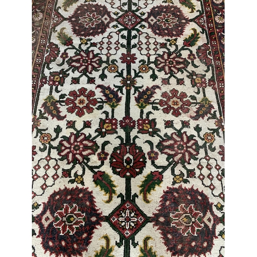 1734 - Attractive Afghan rug with floral design, 270cm x 185cm