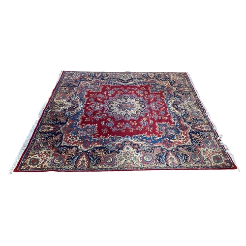 1736 - Good Hamadan carpet with central floral design, red ground 300cm x 295cm