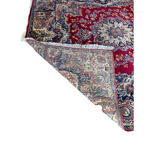 1736 - Good Hamadan carpet with central floral design, red ground 300cm x 295cm