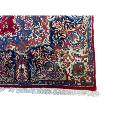 1736 - Good Hamadan carpet with central floral design, red ground 300cm x 295cm