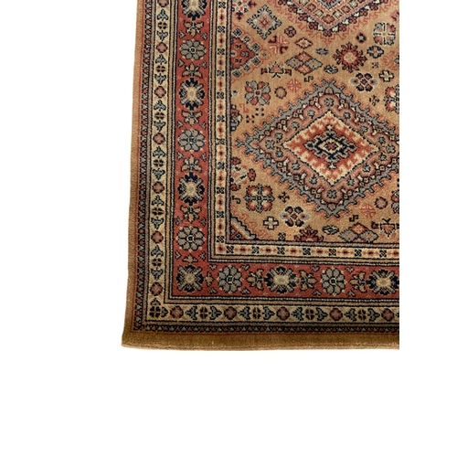 1737 - Belgian Bokhara type rug, with geometric design, mustard ground, 270cm x 225cm