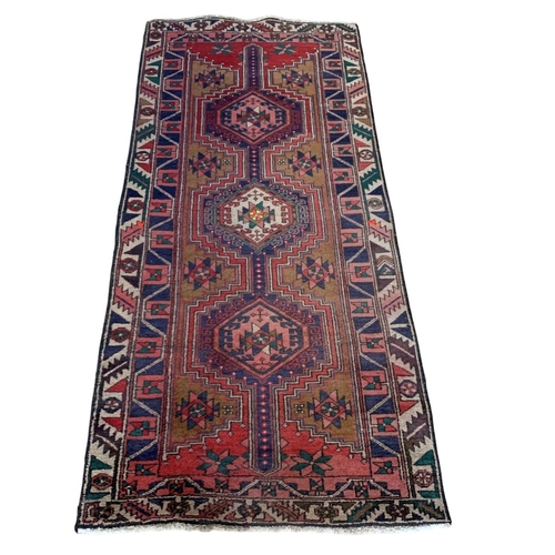 1739 - Good afghan runner, three medallion design, 211cm x 95cm